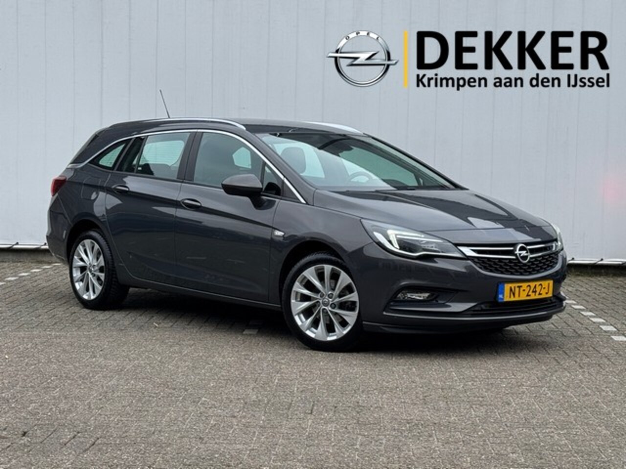 Opel Astra Sports Tourer - 1.0 Edition met 17inch Velgen, PDC, AGR-stoel - AutoWereld.nl