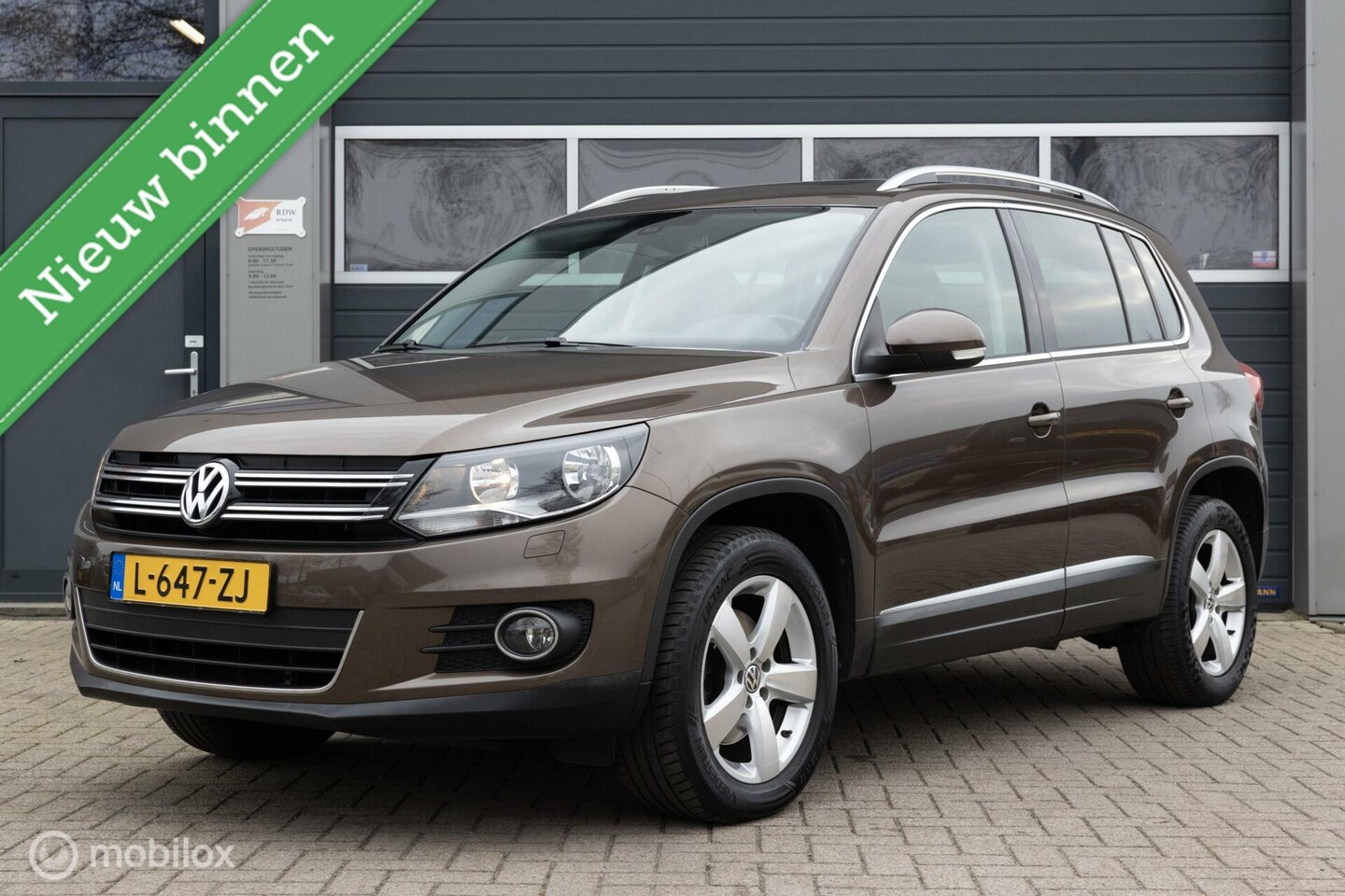 Volkswagen Tiguan - 1.4 TSI Sport&Style PANO NAVI NWE KETTING - AutoWereld.nl