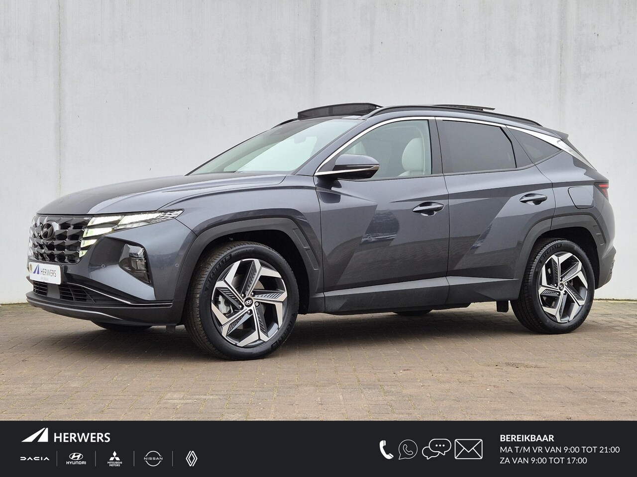 Hyundai Tucson - 1.6 T-GDI HEV Premium Sky 230 pk / Automaat / Glazen schuif- en kanteldak / Apple Carplay - AutoWereld.nl