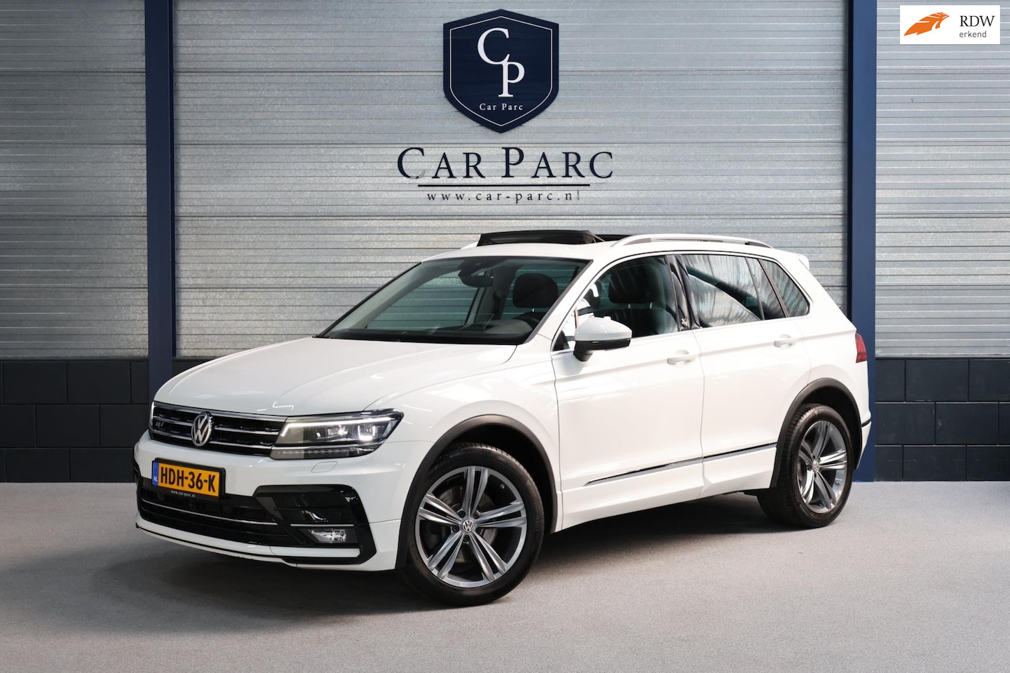 Volkswagen Tiguan - 2.0 TSI 4Motion Sound R-line 180+PK LED/VIRTUAL/S.VERWARMING/LMV/360 CAM/ACC/ECC/12 MND GA - AutoWereld.nl