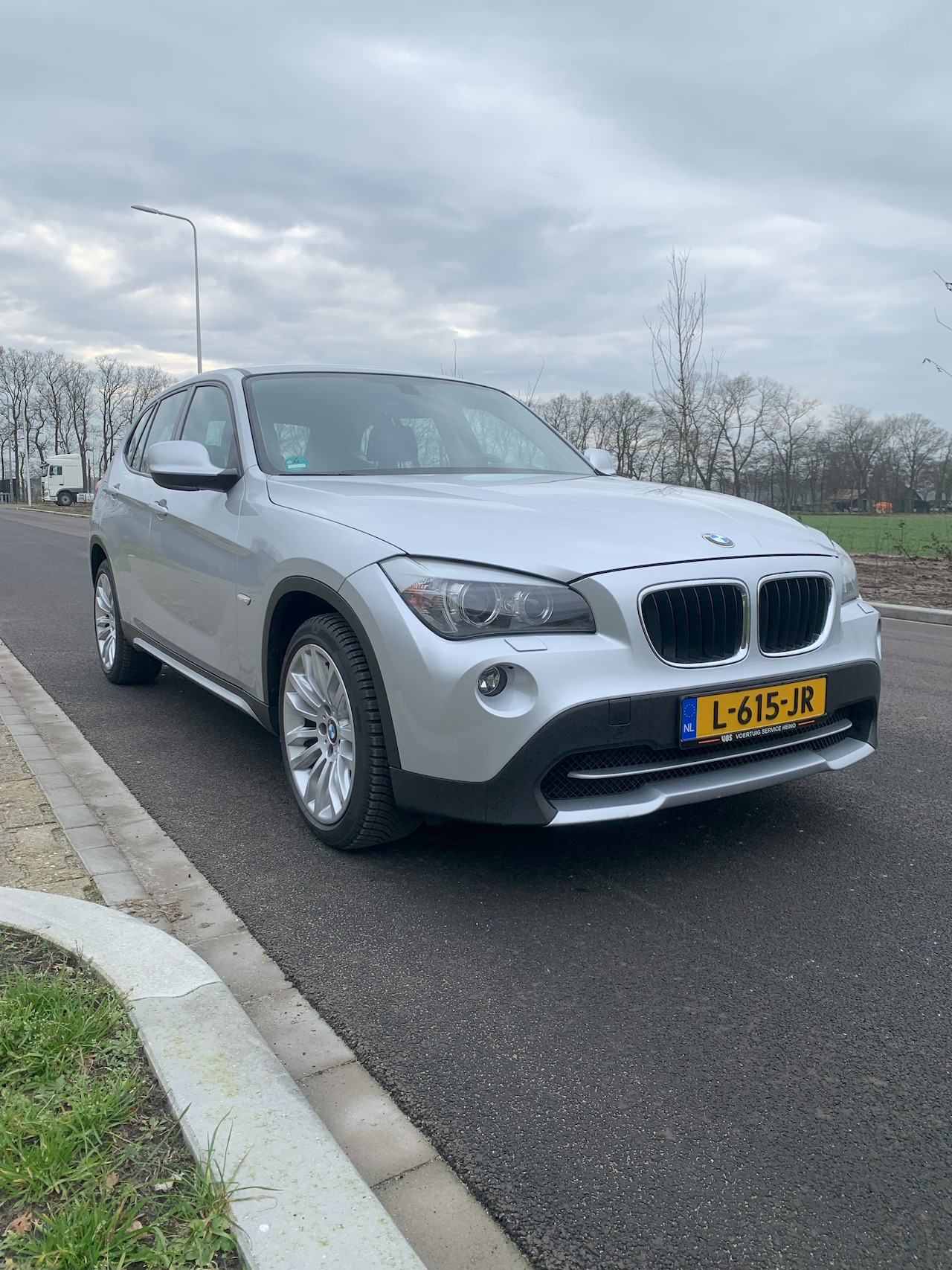 BMW X1 - 1.8i sDrive Executive leren bekleding, afneembare trekhaak - AutoWereld.nl