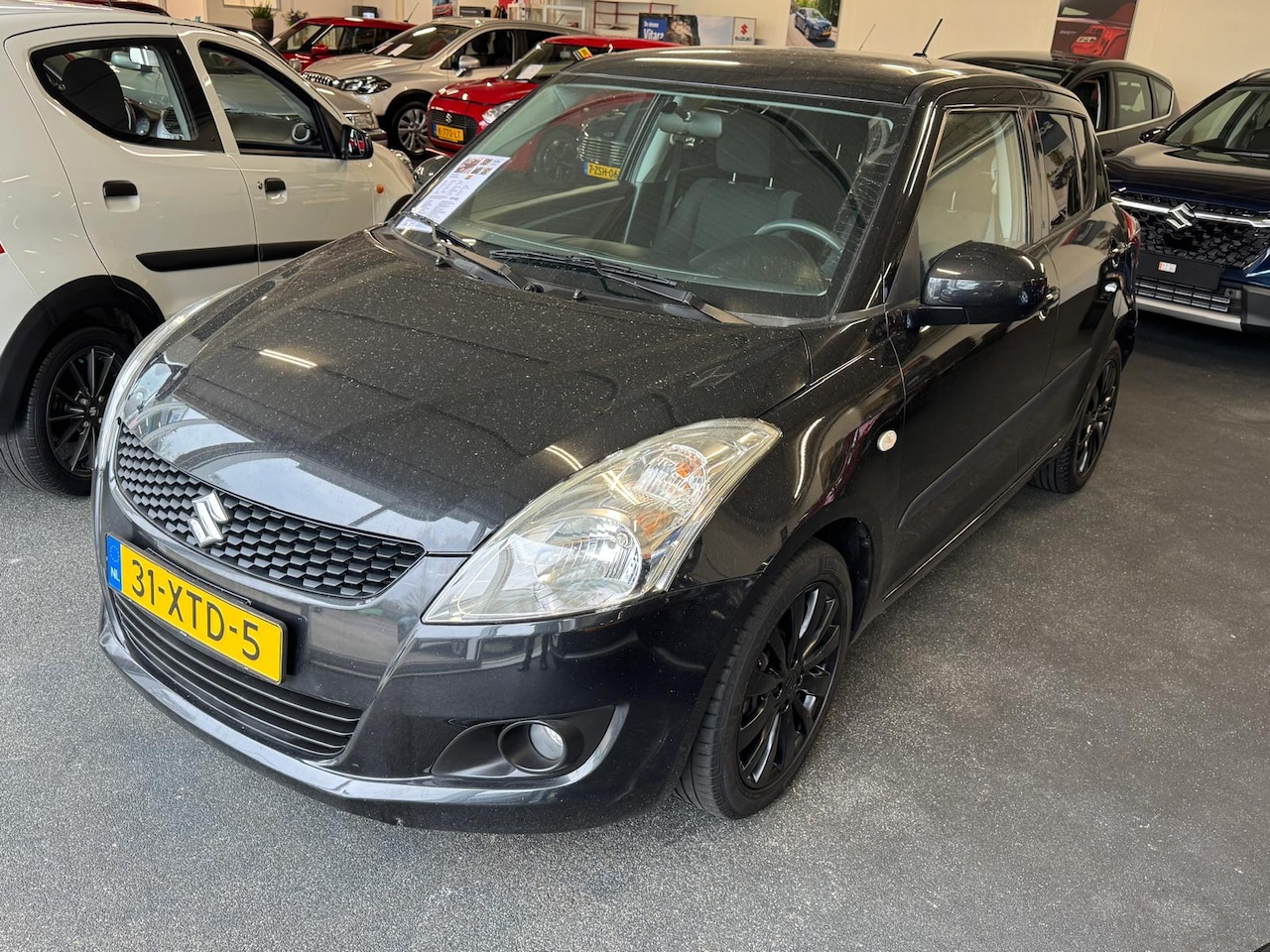 Suzuki Swift - 1.2 94pk 5d Exclusive - AutoWereld.nl