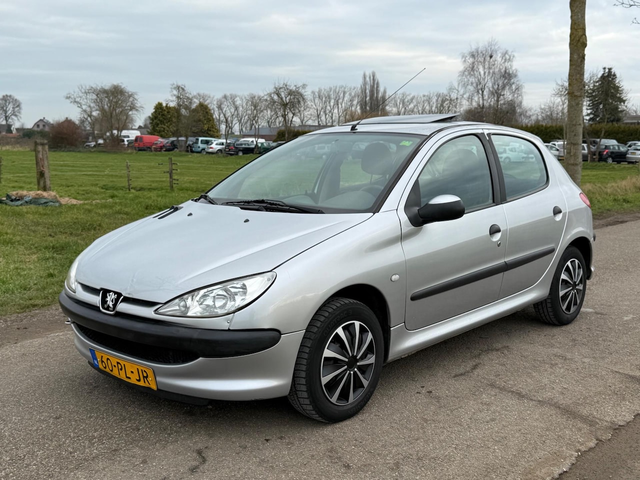 Peugeot 206 - 1.4 Pop' Art 5Drs Apk 06-2025 NAP - AutoWereld.nl