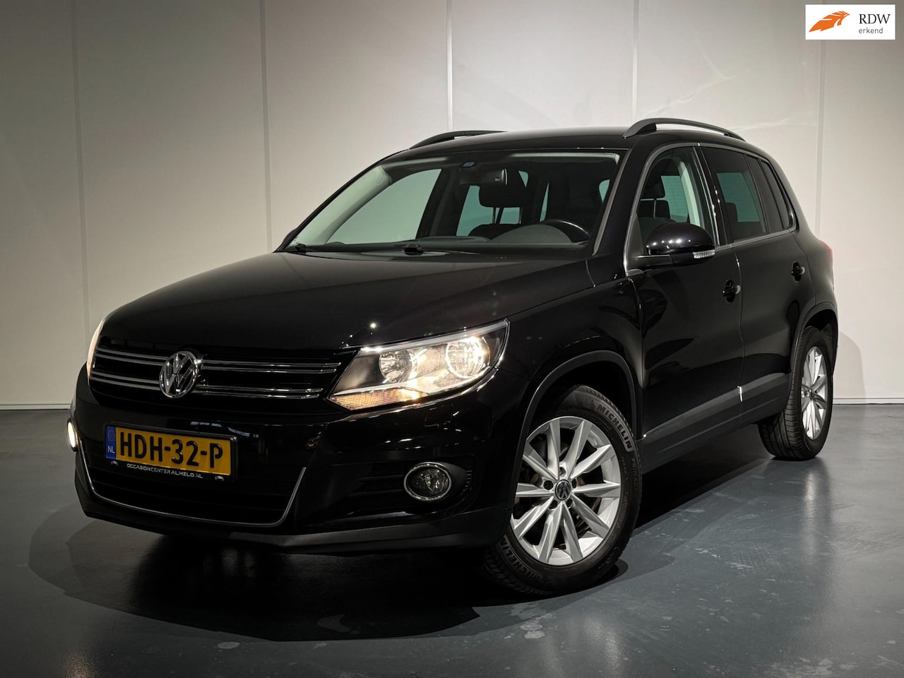 Volkswagen Tiguan - 1.4 TSI Sport /Clima/Cruise/Camera/CarPlay/Trekhaak/LMV - AutoWereld.nl