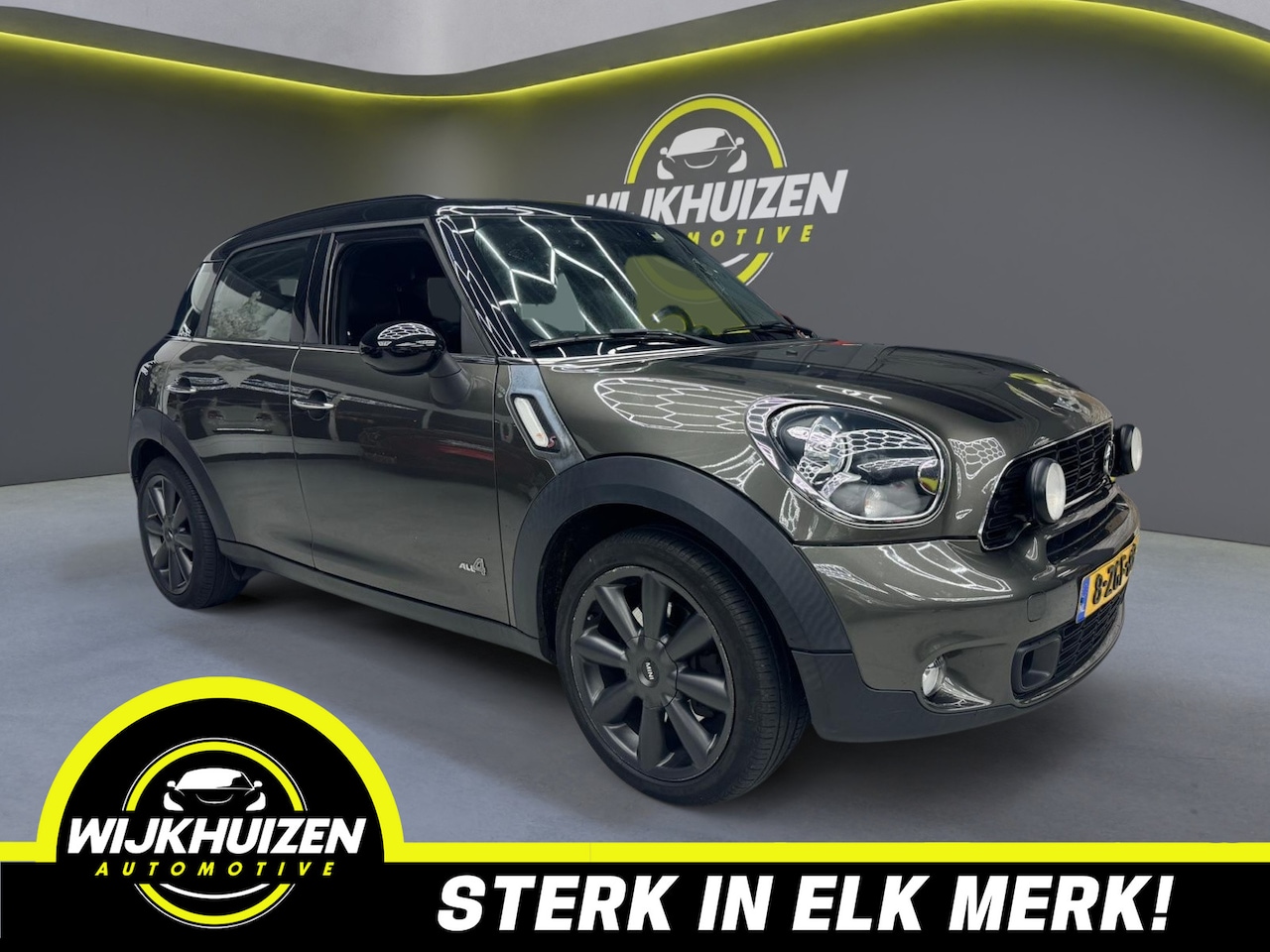 MINI Countryman - Mini 1.6 Cooper S ALL4 Chili met Panorama dak !!! Leder !!! Navigatie !!! - AutoWereld.nl