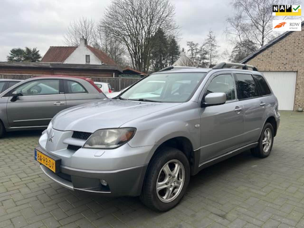 Mitsubishi Outlander Sport - 2.4 4WD 4x4 Airco schuifdak leder stoelverwarming - AutoWereld.nl