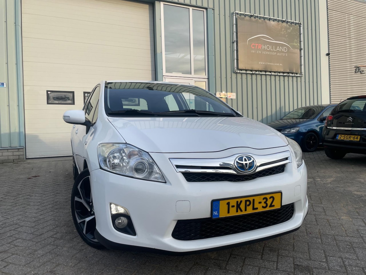 Toyota Auris - 1.8 Full Hybrid Aspiration (bj 2011) AUTOMAAT|LMV|CLIMA! - AutoWereld.nl