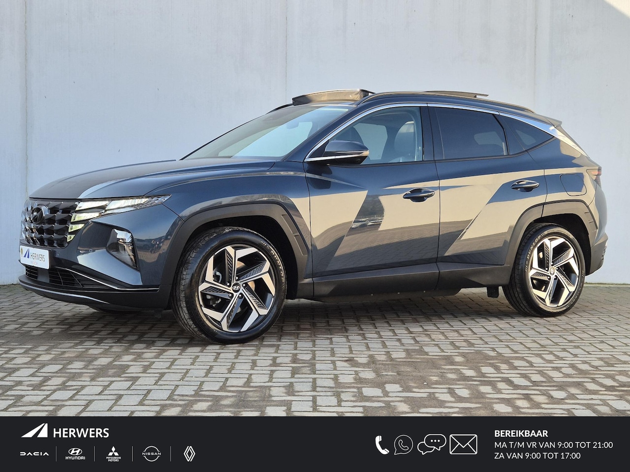 Hyundai Tucson - 1.6 T-GDI PHEV Premium Sky 4WD / Glazen schuif- en kanteldak / Apple Carplay Android Auto - AutoWereld.nl