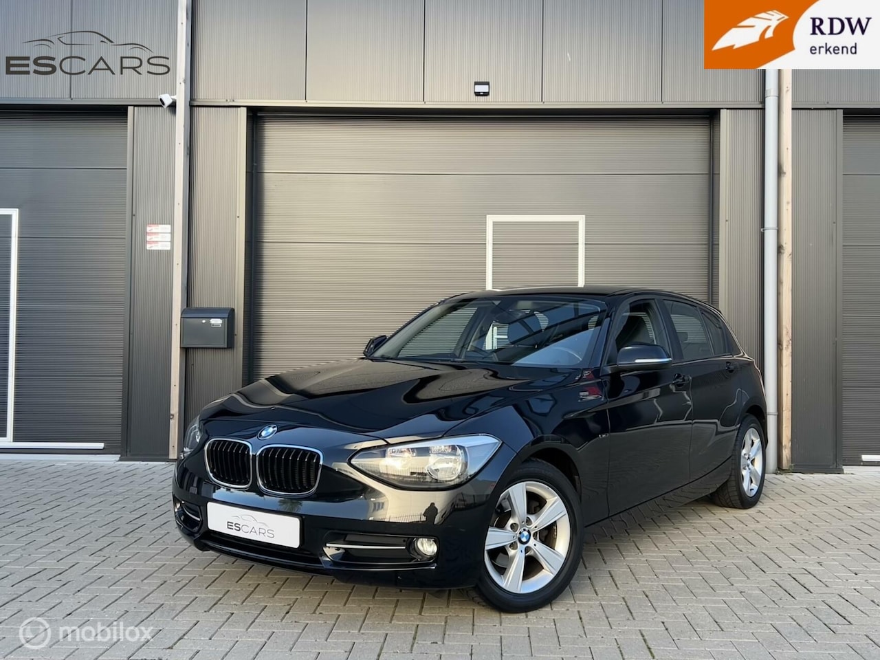 BMW 1-serie - 116i Business+ Stoelverwarming | Airco | Aux - AutoWereld.nl