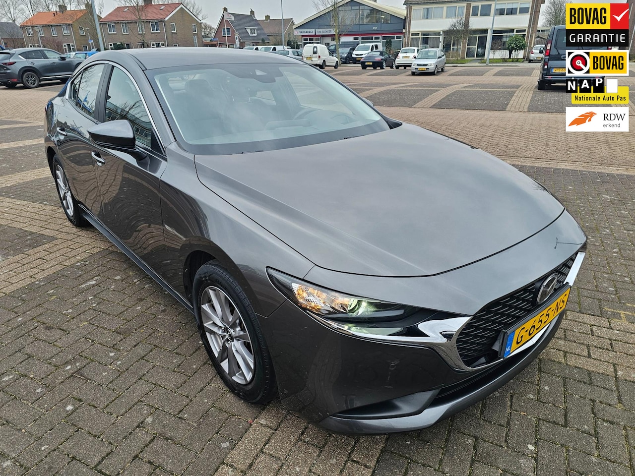 Mazda 3 - 2.0 SkyActiv-G M Hybrid |Bose|Adaptive Cruise|Elektrische stoelen met geheugen|Head-up dis - AutoWereld.nl