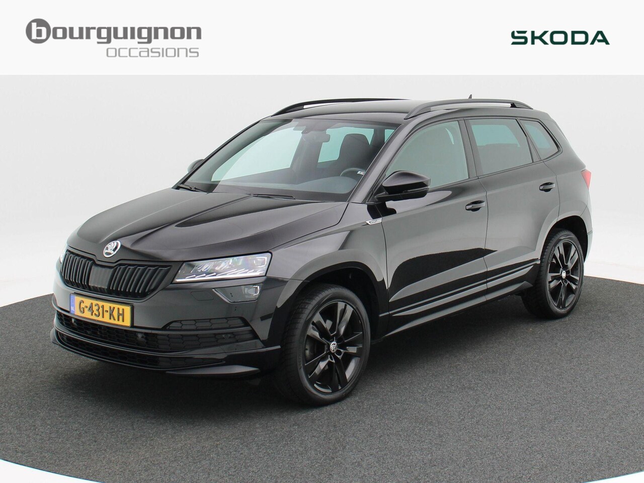 Skoda Karoq - 1.5 TSi 150 Pk Automaat Sportline Business | Full LED | Navigatie | Camera | Cruise Contro - AutoWereld.nl