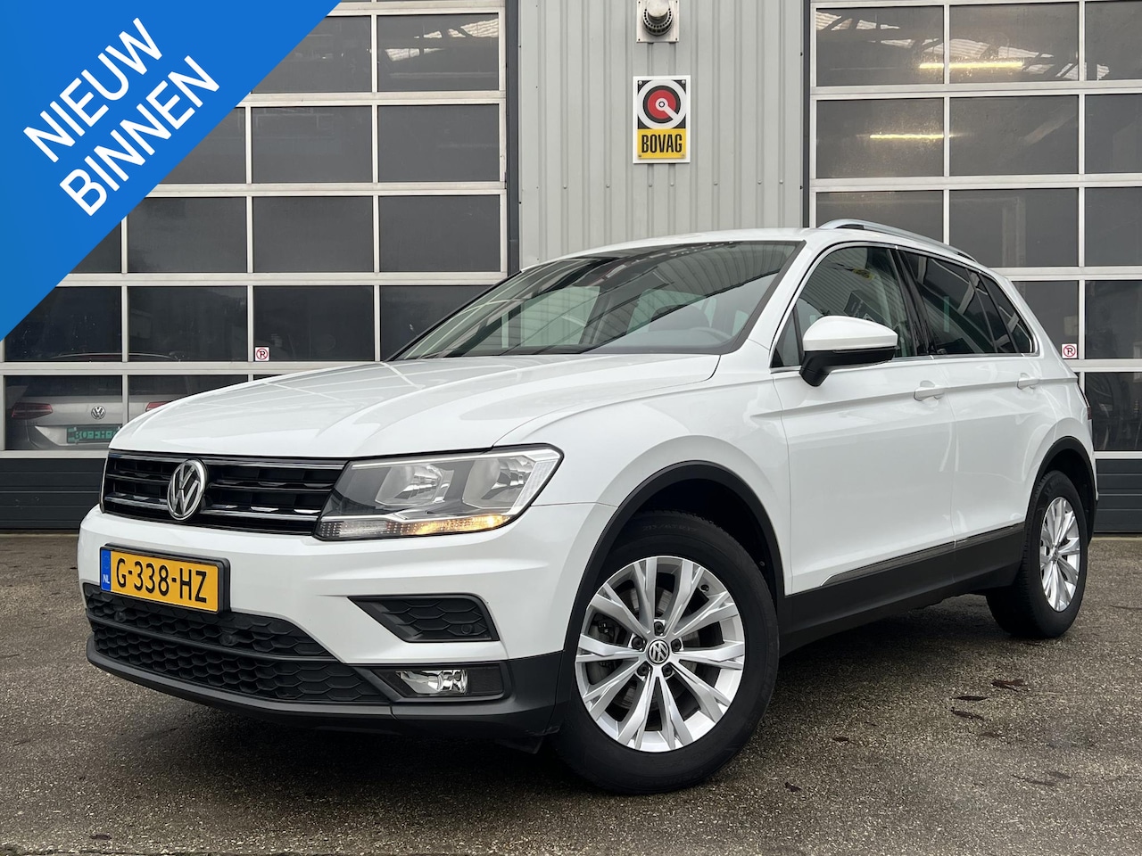 Volkswagen Tiguan - 1.5 TSI Comfortline Business Stoelverwarming Carplay PDC LM velgen - AutoWereld.nl