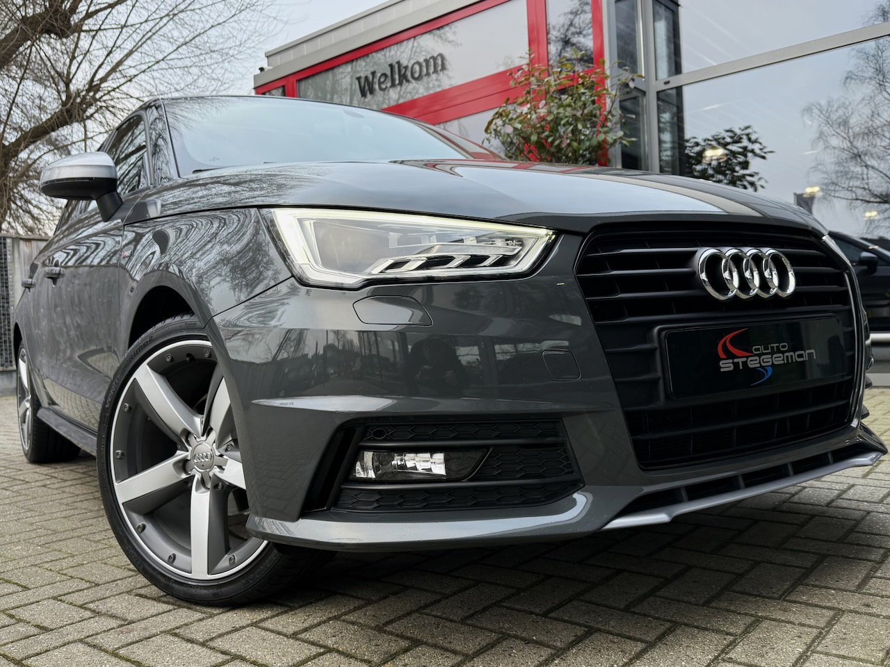 Audi A1 Sportback - 1.0 TFSI *!* S-LINE *!* NAVI/ PANORAMADAK/ BI-XENON/ 17 INCH *!* - AutoWereld.nl