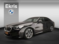 BMW 5-serie - Sedan 520d | M-Sportpakket | LED | HUD | Trekhaak | Schuifdak | Comfortzetels | DAB | Harm