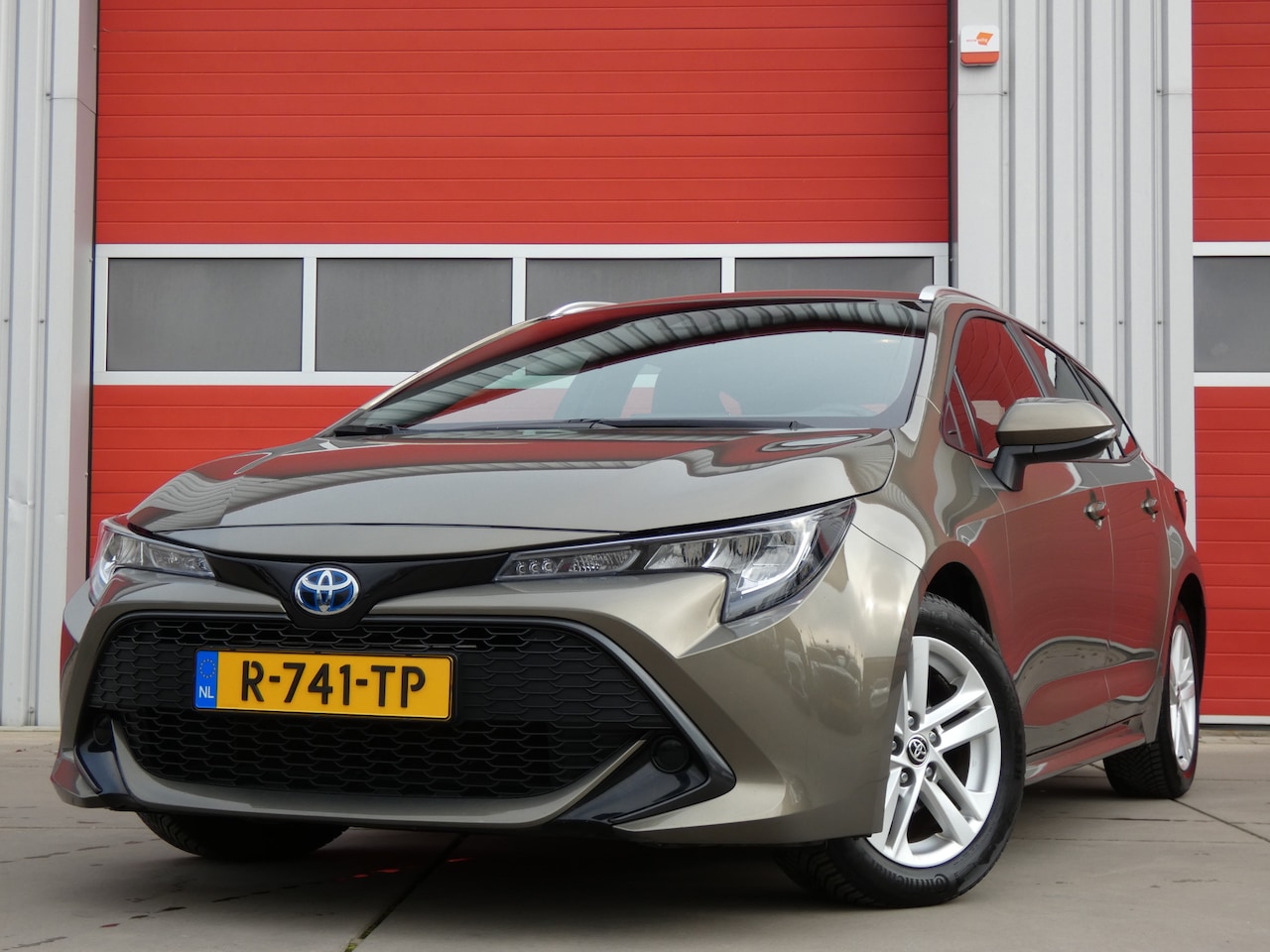 Toyota Corolla Touring Sports - 1.8 Hybrid Active/ unieke km/ zeer mooi! - AutoWereld.nl