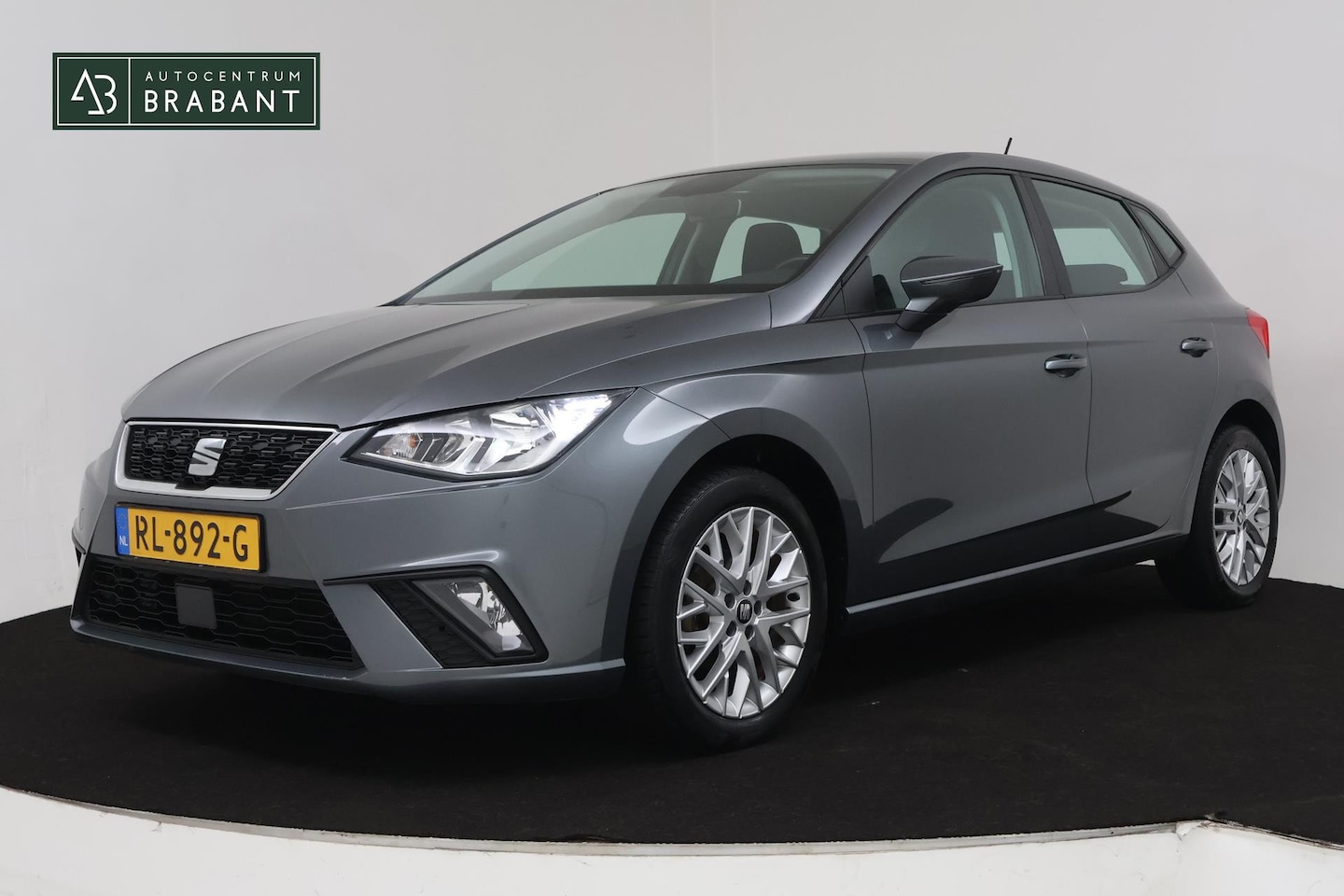 Seat Ibiza - 1.0 TSI Style (NAVIGATIE, PARKEERSENSOREN, CRUISE, CARPLAY, NL-AUTO, GOED ONDERHOUDEN) - AutoWereld.nl