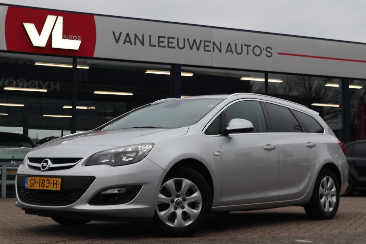 Opel Astra Sports Tourer - 1.6 CDTi Business + | Airco | Cruise | Navi - AutoWereld.nl