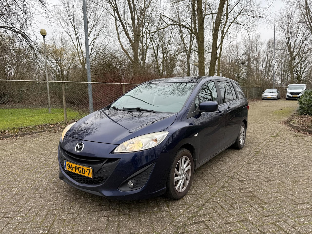 Mazda 5 - 1.8 Business 7pers Airco Cruise Trekhaak Ocean Blue - AutoWereld.nl