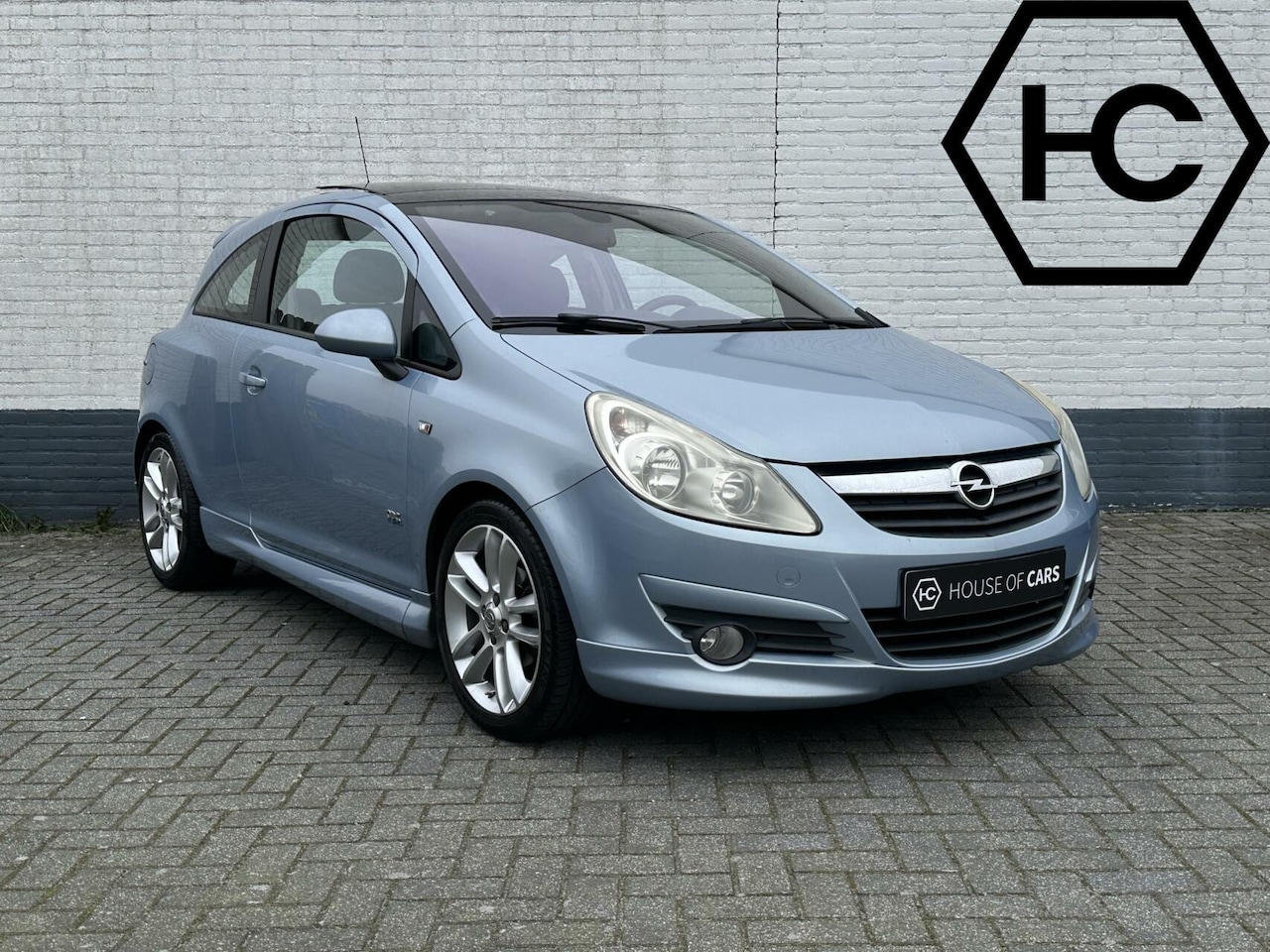 Opel Corsa - 1.4 16V Cosmo OPC-Line Clima Cruise Pano NAP - AutoWereld.nl