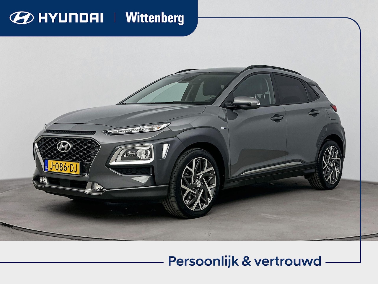 Hyundai Kona - 1.6 GDI HEV Premium | Stoel + stuurverwarming | Trekhaak | Head-up display | Navigatie | C - AutoWereld.nl