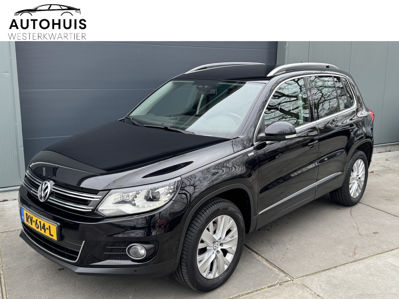 Volkswagen Tiguan - 1.4 TSI 160pk Sport&Style Stoelverwarming Navigatie Climatronic Xenon - AutoWereld.nl