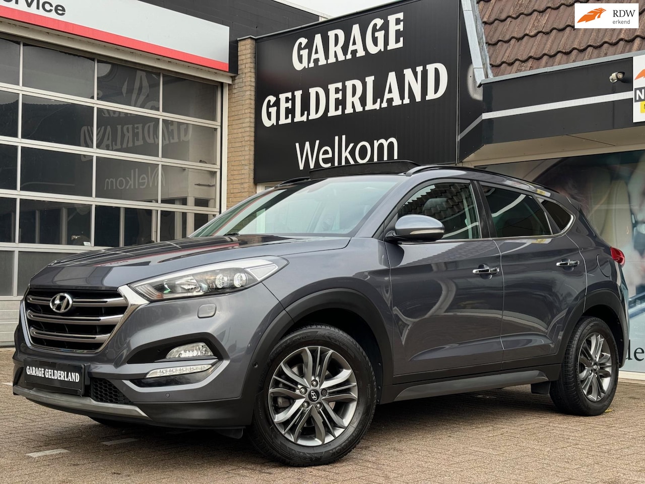 Hyundai Tucson - 1.6 T-GDi Premium 4WD 177PK | Pano | Navi | Camera | Trekhaak | Cruise | Climate | Pdc | I - AutoWereld.nl