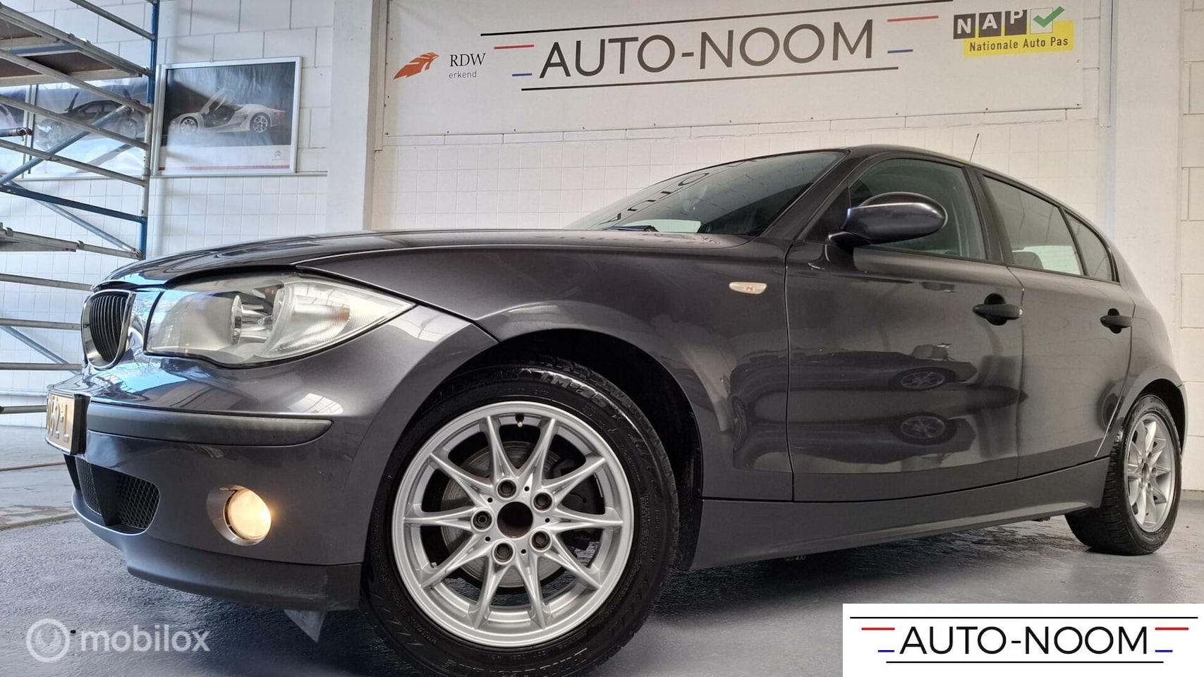 BMW 1-serie - 116i AIRCO/ECC/16"LM/ZOMER&WINTERSET/NETTE AUTO ✔️ - AutoWereld.nl