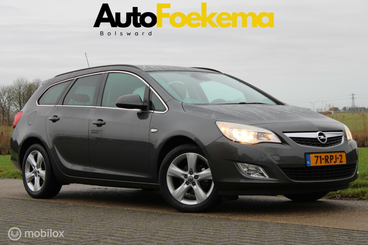 Opel Astra Sports Tourer - 1.4 Turbo Edition 100% ONDERHOUDEN NETTE AUTO - AutoWereld.nl