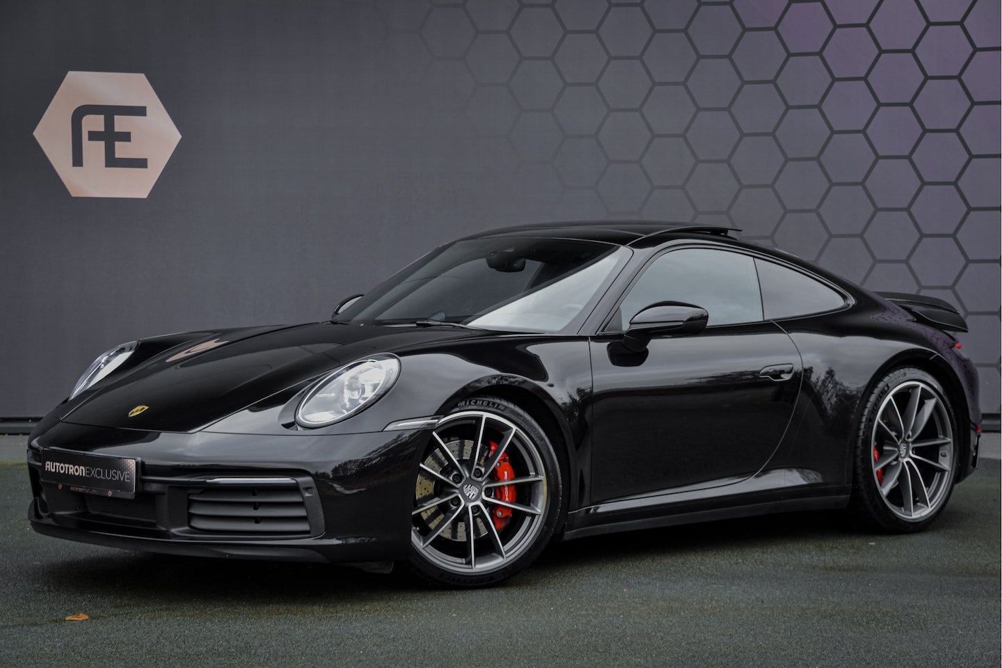 Porsche 911 - 3.0 Carrera 4 S | AKRAPOVIC | 4-WIELBESTURING | NOVITEC ACCESSOIRES | BOSE | GLAZEN SCHUIF - AutoWereld.nl