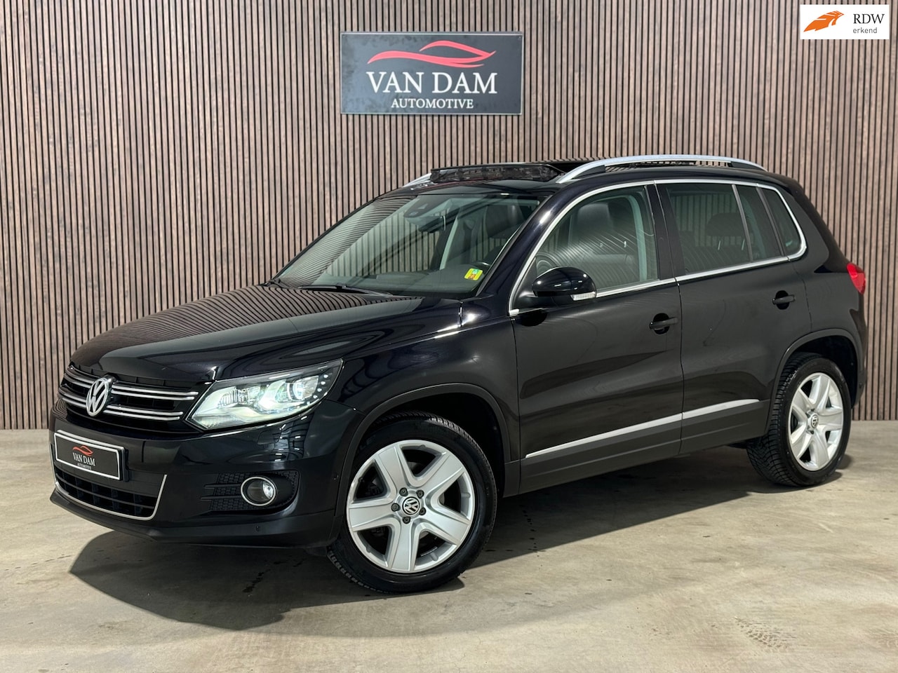 Volkswagen Tiguan - 2.0 TSI Sport&Style 4motion 2012 DSG PANO LEDER - AutoWereld.nl