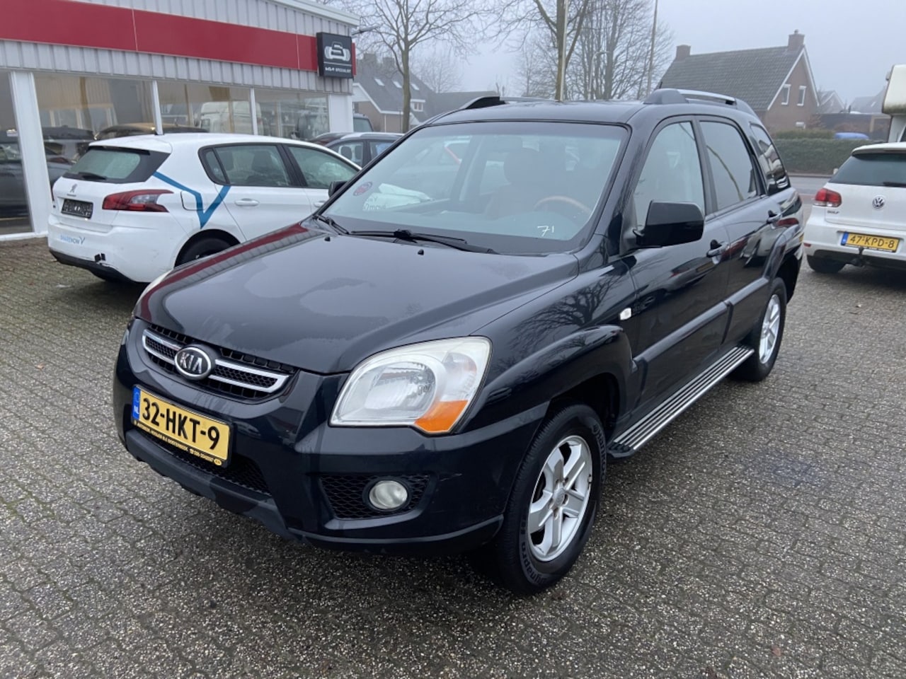 Kia Sportage - 2.7 V6 X-ecutive 4WD 2.7 V6 X-ecutive 4WD - AutoWereld.nl