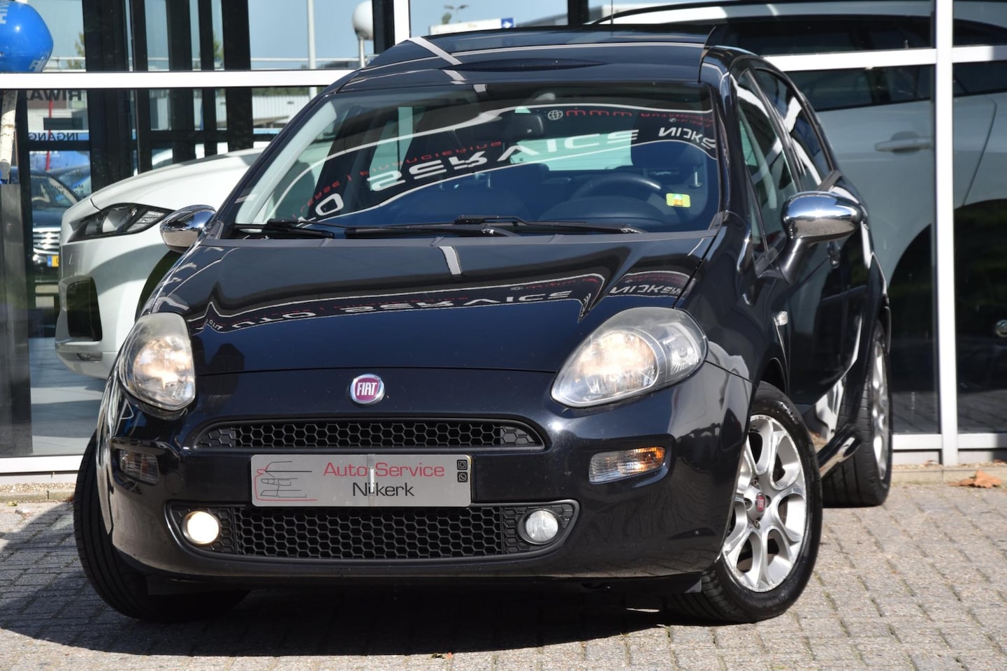 Fiat Punto Evo - 0.9 TwinAir Lounge Airco Leder Panorama dak 1ste Eigenaar - AutoWereld.nl