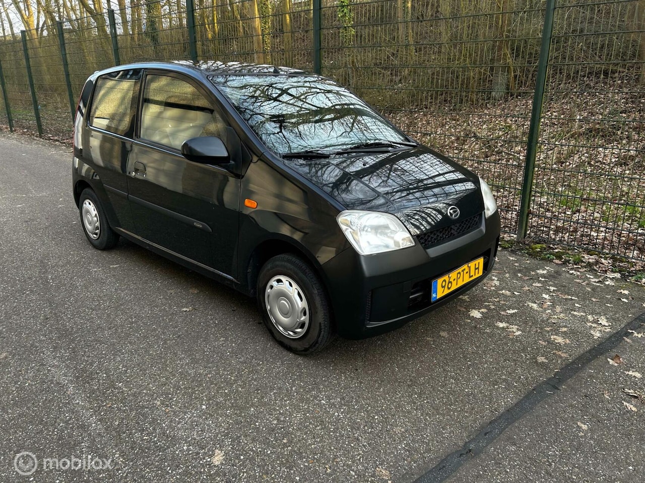 Daihatsu Cuore - 1.0-12V Kyoto ZEER WEINIG KM - AutoWereld.nl