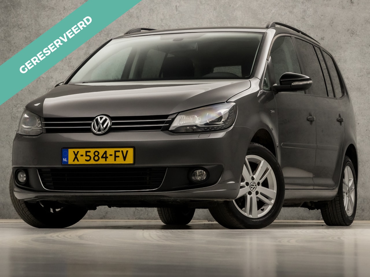 Volkswagen Touran - 1.2 TSI Highline 7 Persoons (NAVIGATIE, CLIMATE, STOELVERWARMING, GETINT GLAS, SPORTSTOELE - AutoWereld.nl