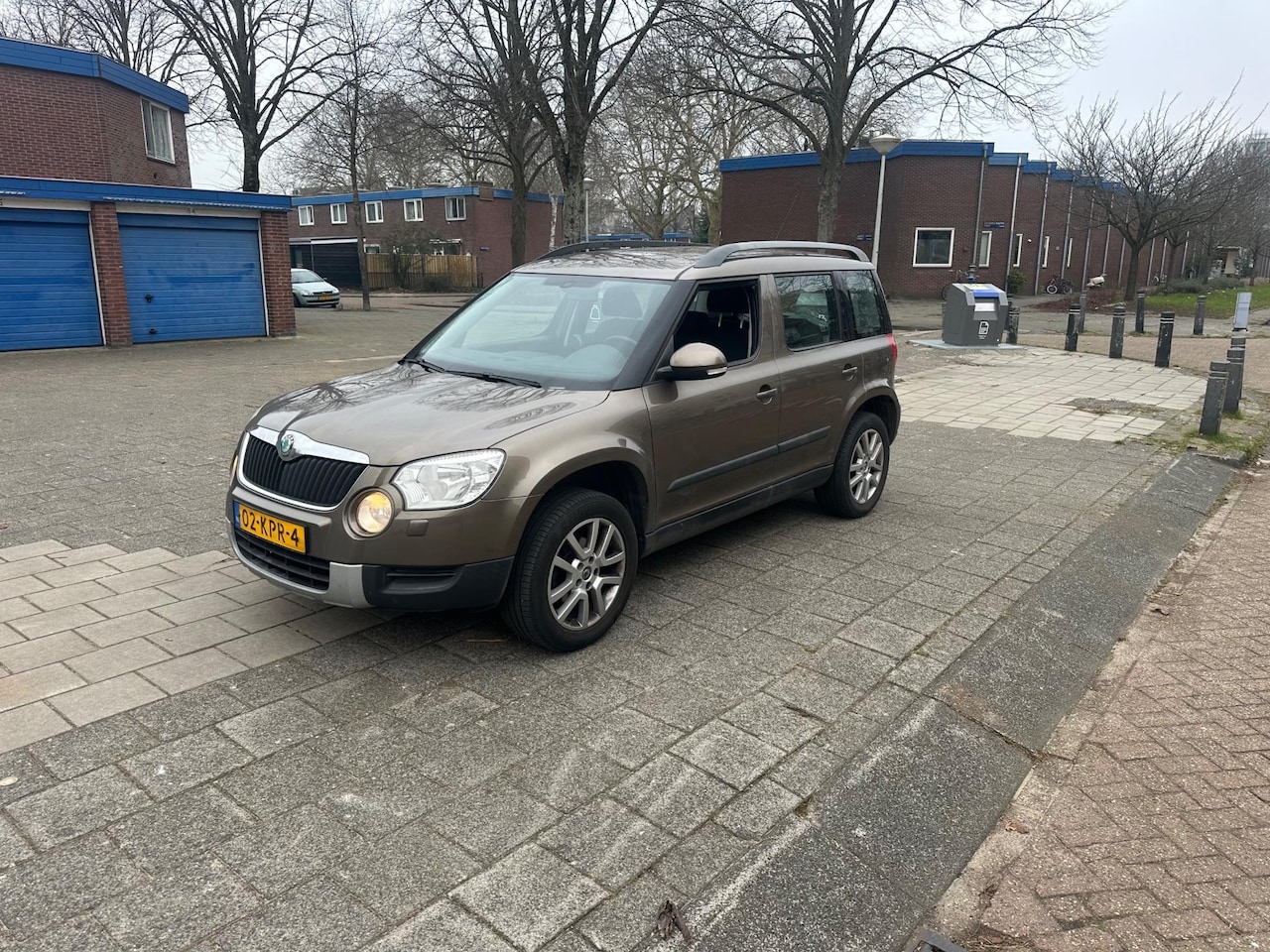 Skoda Yeti - 1.2 TSI Ambition 1-eigenaar Airco Cruise Brown Metallic - AutoWereld.nl