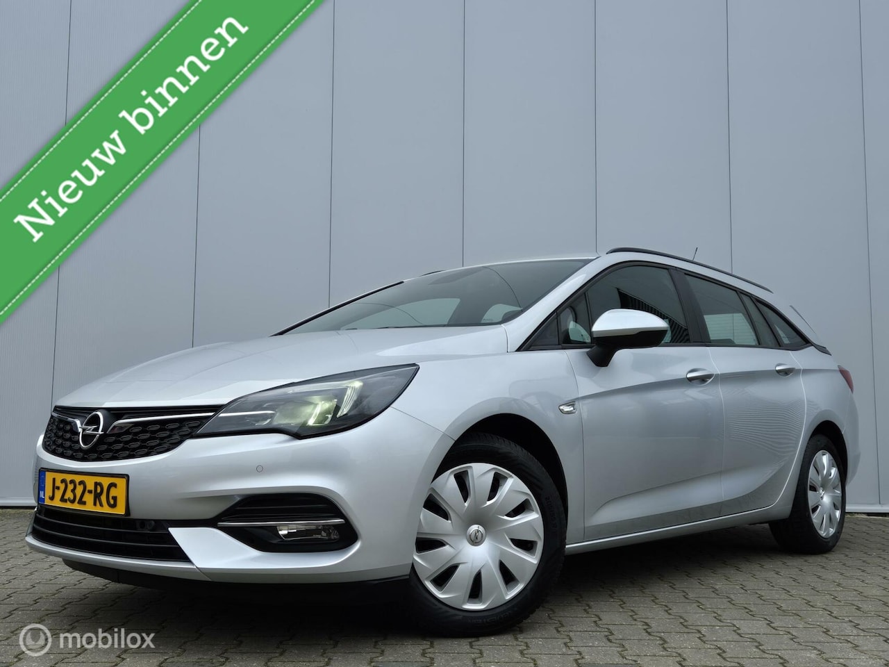 Opel Astra Sports Tourer - 1.2 EXECUTIVE/CAMERA/LED/CARPLAY/TREKHAAK/CLIMATE/NAVI/BLUETOOTH - AutoWereld.nl