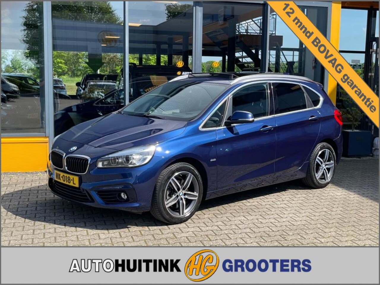 BMW 2-serie Active Tourer - 220I Cent. High Executive - schuif/kantel dak - leer - camera - AutoWereld.nl