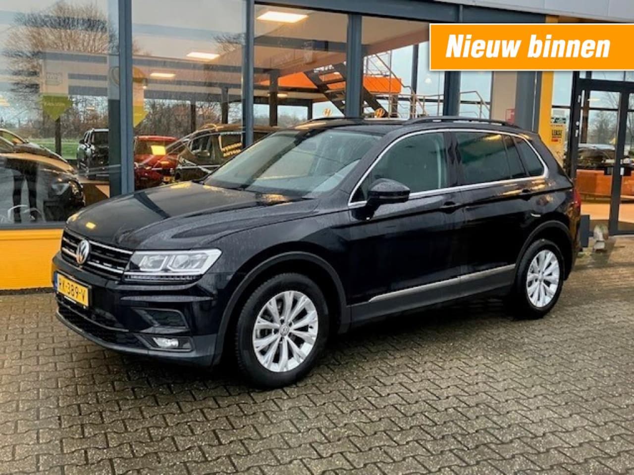 Volkswagen Tiguan - 1.4 TSI 150 pk Comfortline - Panoramadak - electr. trekhaak - AutoWereld.nl