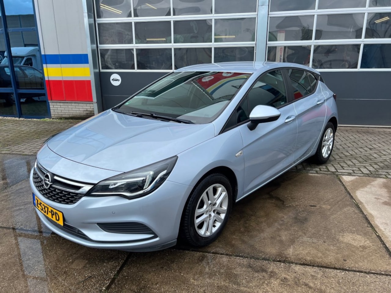 Opel Astra - 1.4 Turbo *NAVI* *ACHTERUITRIJCAMERA* *LED* - AutoWereld.nl