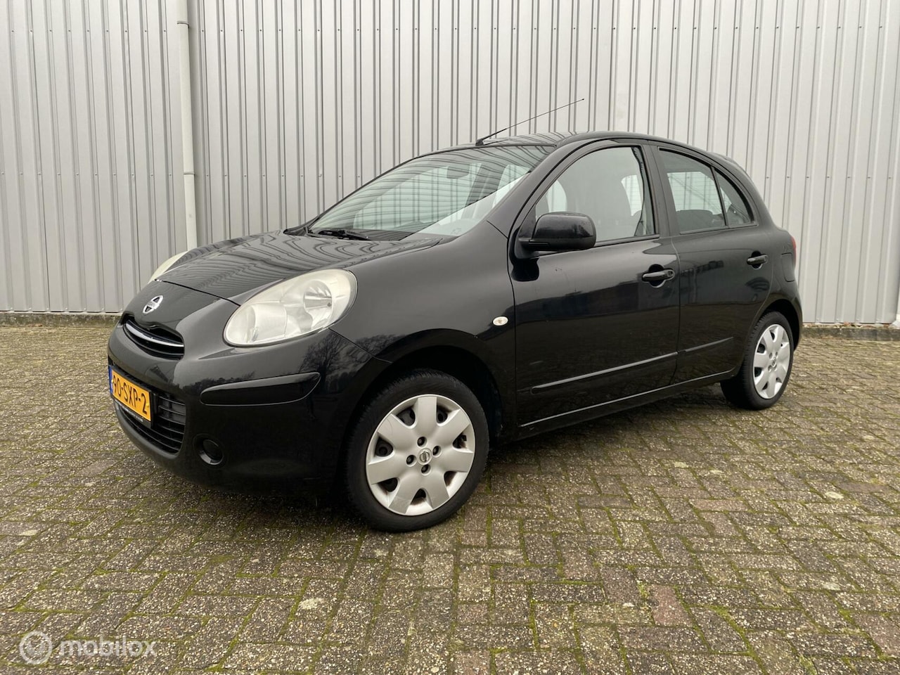 Nissan Micra - 1.2 Acenta 5DR Airco Cruise Navi Nette Auto - AutoWereld.nl