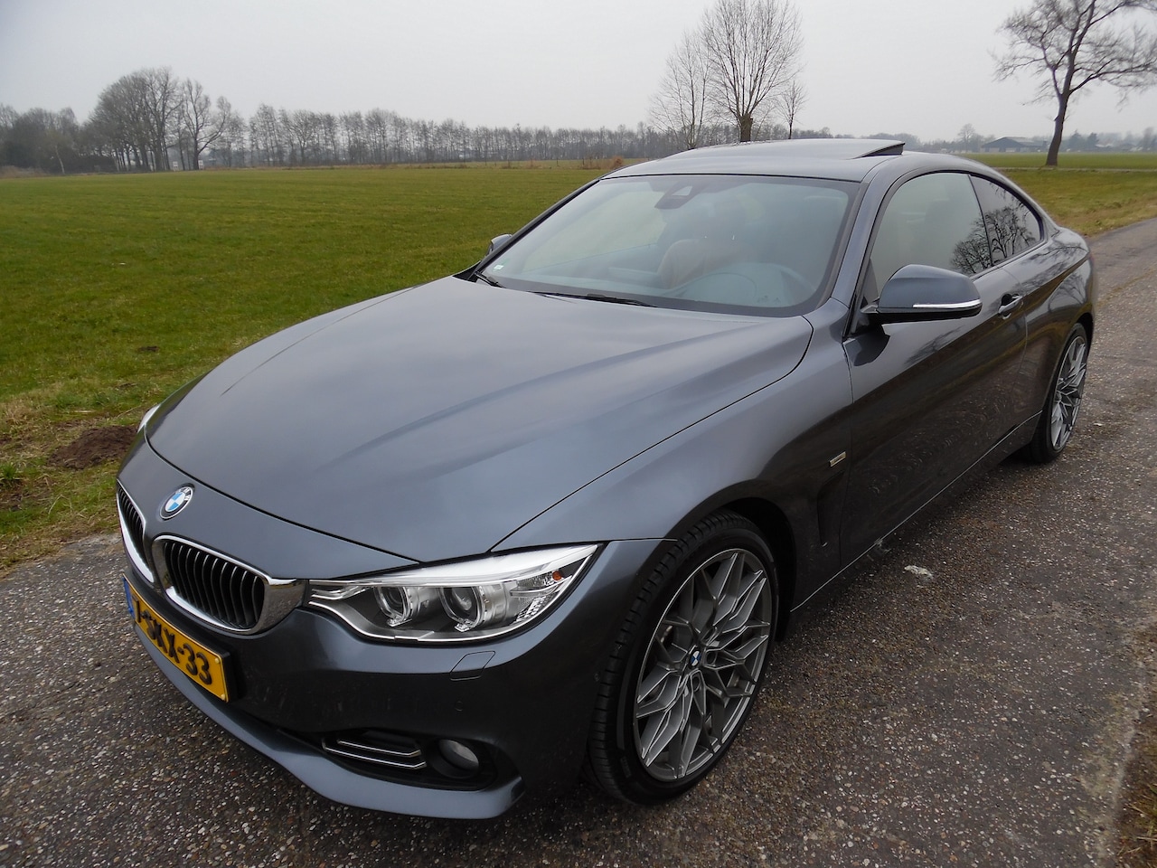 BMW 4-serie Coupé - 435i High Executive Coupe - AutoWereld.nl