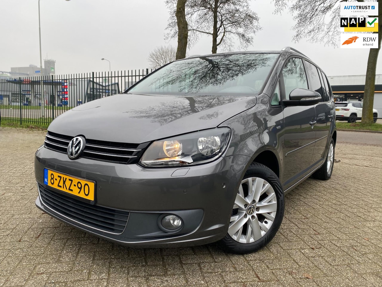 Volkswagen Touran - 1.2 TSI Highline BlueMotion Navi Pdc Cruise Tel Trekhaak - AutoWereld.nl