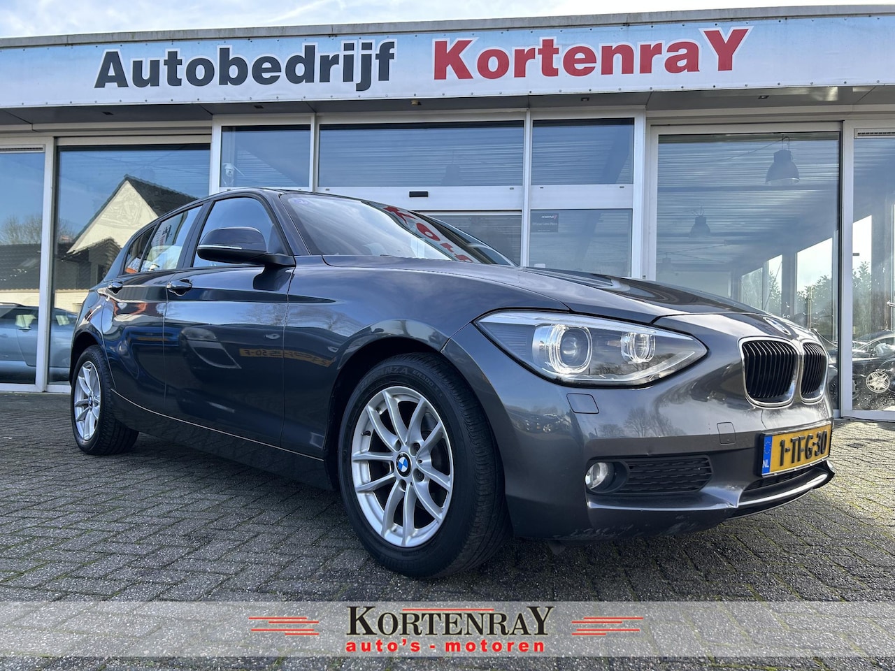 BMW 1-serie - 116i Executive ecc/cruise contr/bi-xenon/navi/pdc/top occasion - AutoWereld.nl