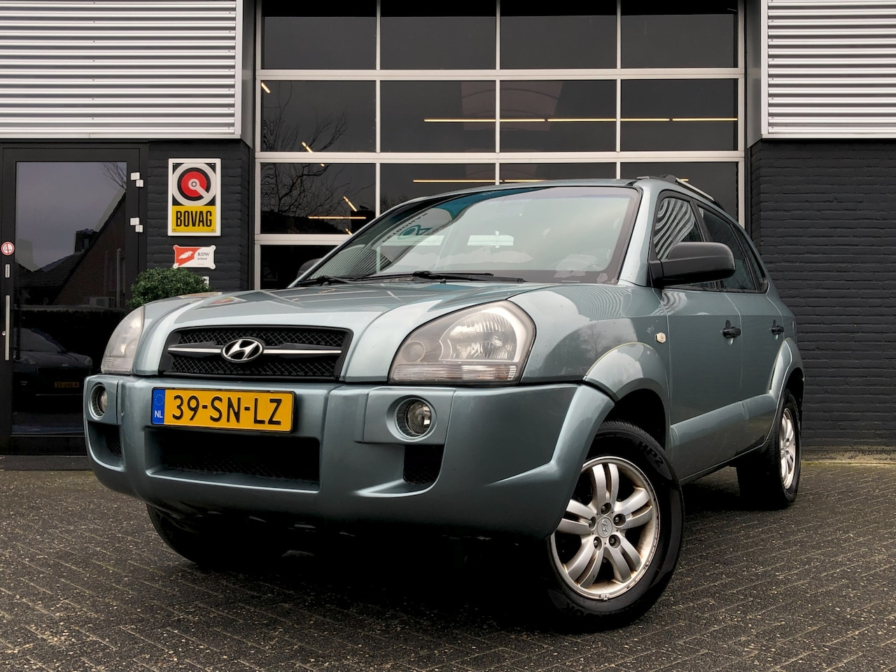 Hyundai Tucson - 2.0i Active 2.0i Active, Airco, Radio, Trekhaak, NAP - AutoWereld.nl