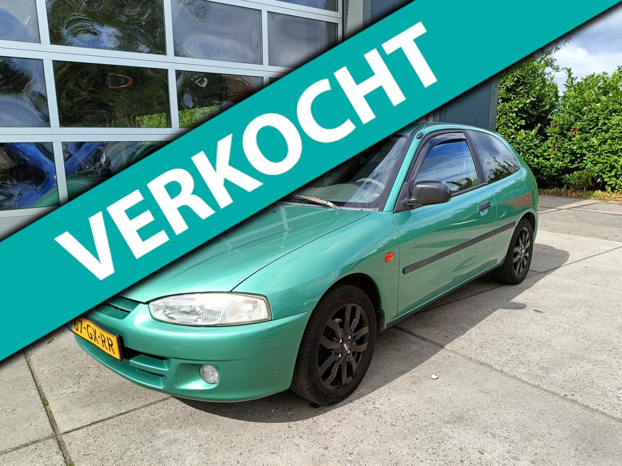 Mitsubishi Colt - 1.3 GLXi SE Airco - AutoWereld.nl