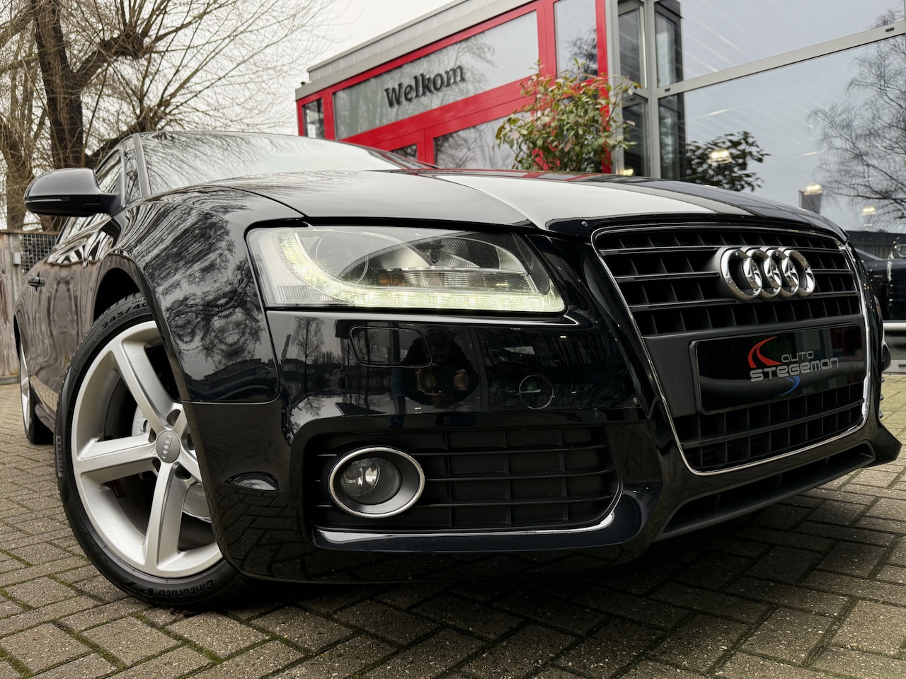 Audi A5 Coupé - 2.0 TFSI 211PK AUT. *!* S-LINE *!* BI-XENON/ 18 INCH/ LEDER/ LED *!* - AutoWereld.nl