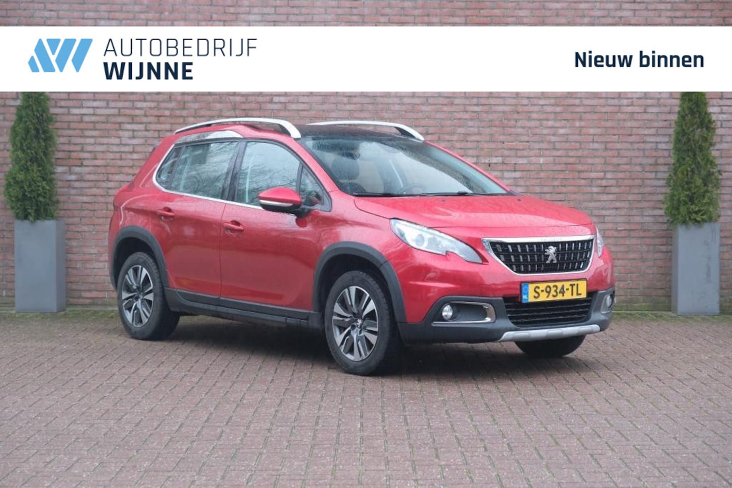 Peugeot 2008 - 1.2 PureTech 82pk Allure | Navi | Climate | Panoramadak | PDC | Trekhaak - AutoWereld.nl