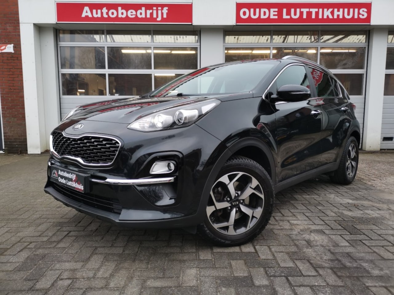 Kia Sportage - 1.6 GDI DynamicLine Camera Cruise Navi Trekhaak - AutoWereld.nl