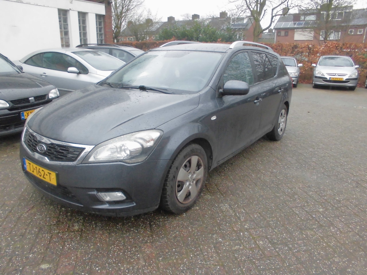 Kia Cee'd - 1.4 CVVT X-ecutive 1.4 CVVT X-ecutive - AutoWereld.nl