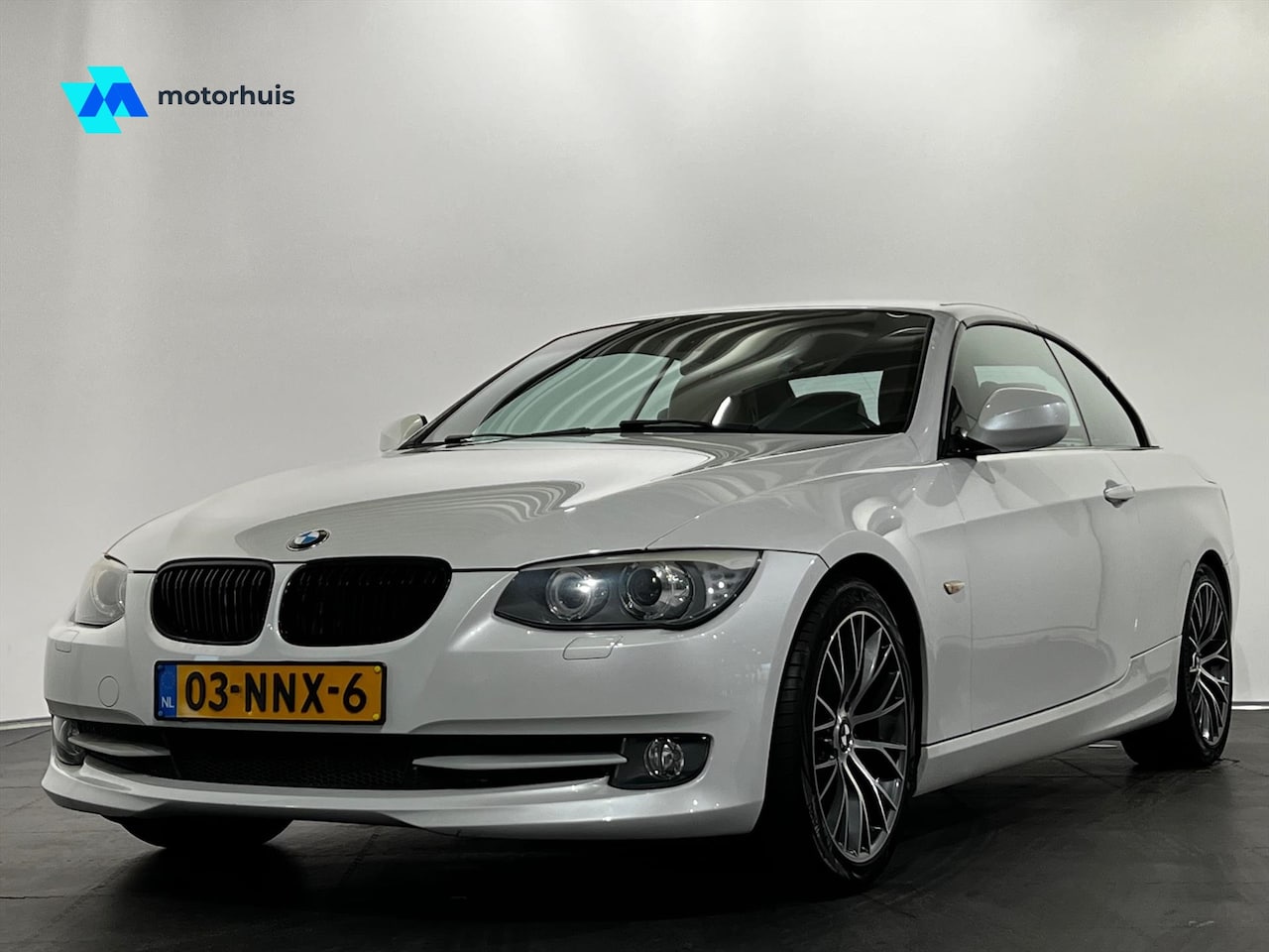 BMW 3-serie Cabrio - (e93) 320i 170pk Aut | LEDER | NAVIGATIE - AutoWereld.nl